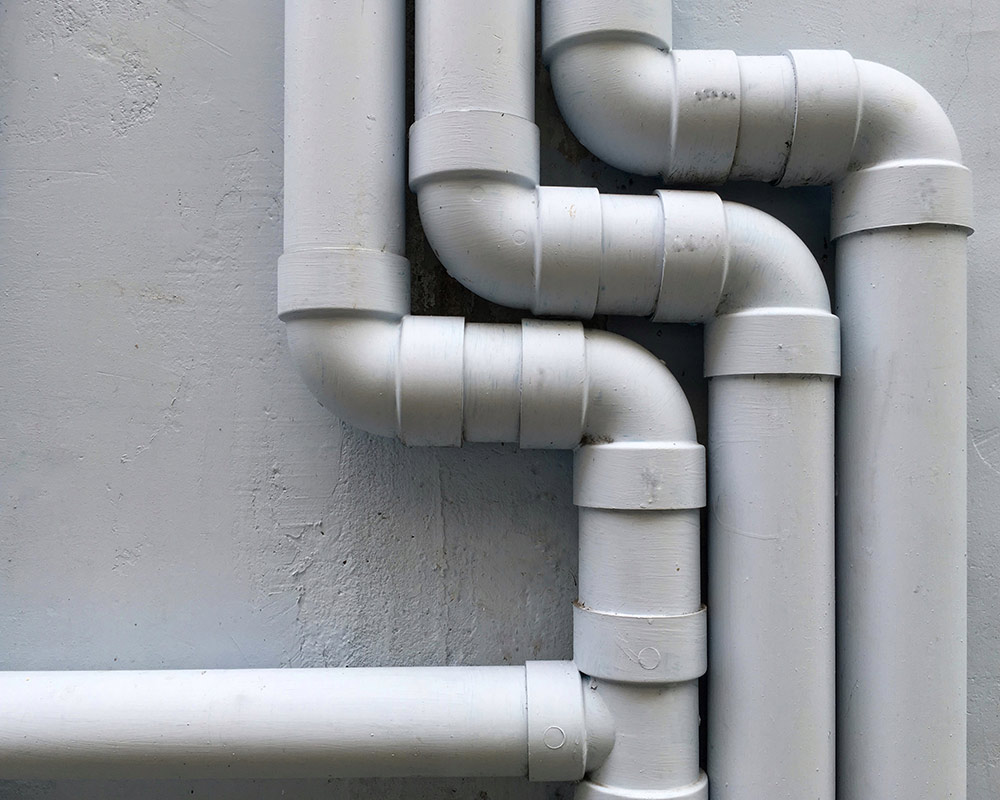 drain pipes installed on a wall Cornwall NY